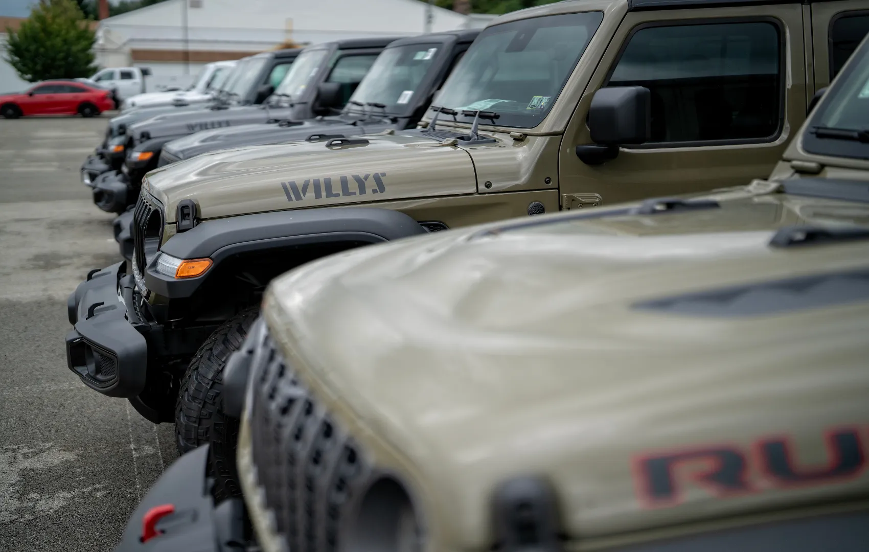 Why buy or lease from C. Harper CDJR - Jeep willys sitting on dealership lot