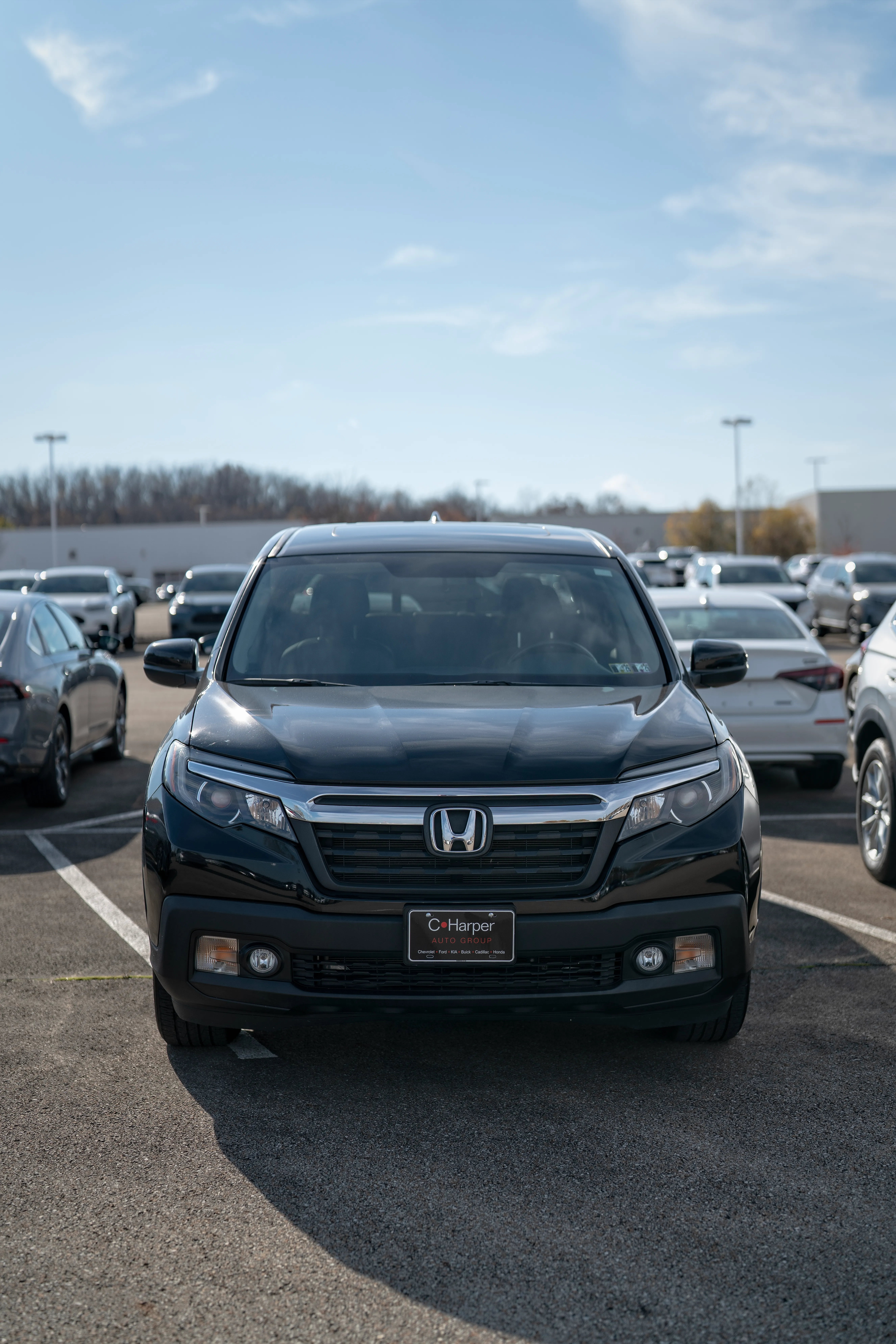 Honda CRV sitting in C. Harper Honda parking lot
